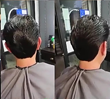 Nuca de un cliente con corte terminado y degradado limpio, vista desde atrás